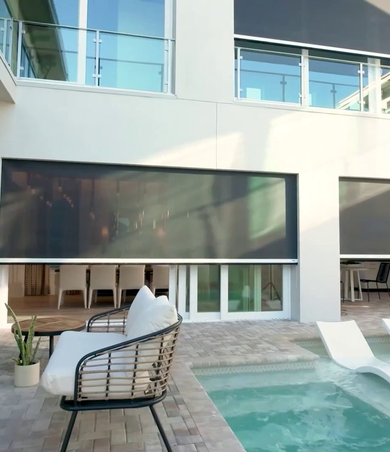 Patio on luxury home with Phantom Screen motorized screens