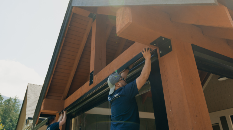 Phantom Screens distributor installing patio screen