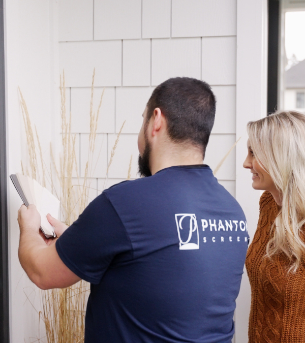 Phantom Screens expert showing homeowners color swatches